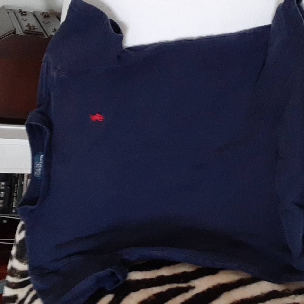 Boy's faded navy blue Polo t-shirt. Size 8, 100 percent cotton with yellow logo.